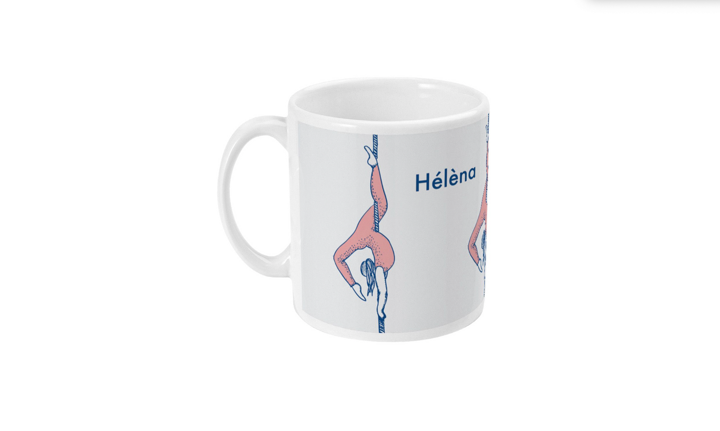 a white coffee mug with a picture of a person doing a handstand