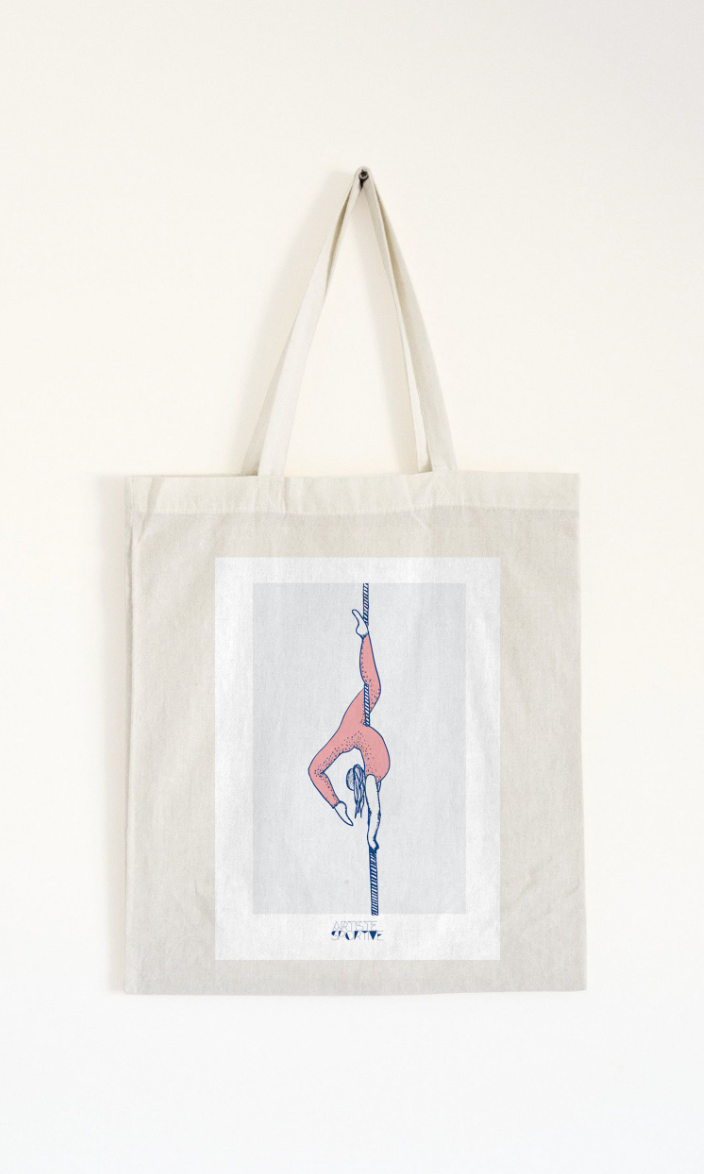 a tote bag hanging on a wall