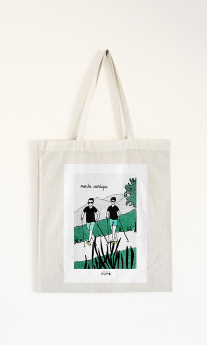 a tote bag with a picture of two people on a bike