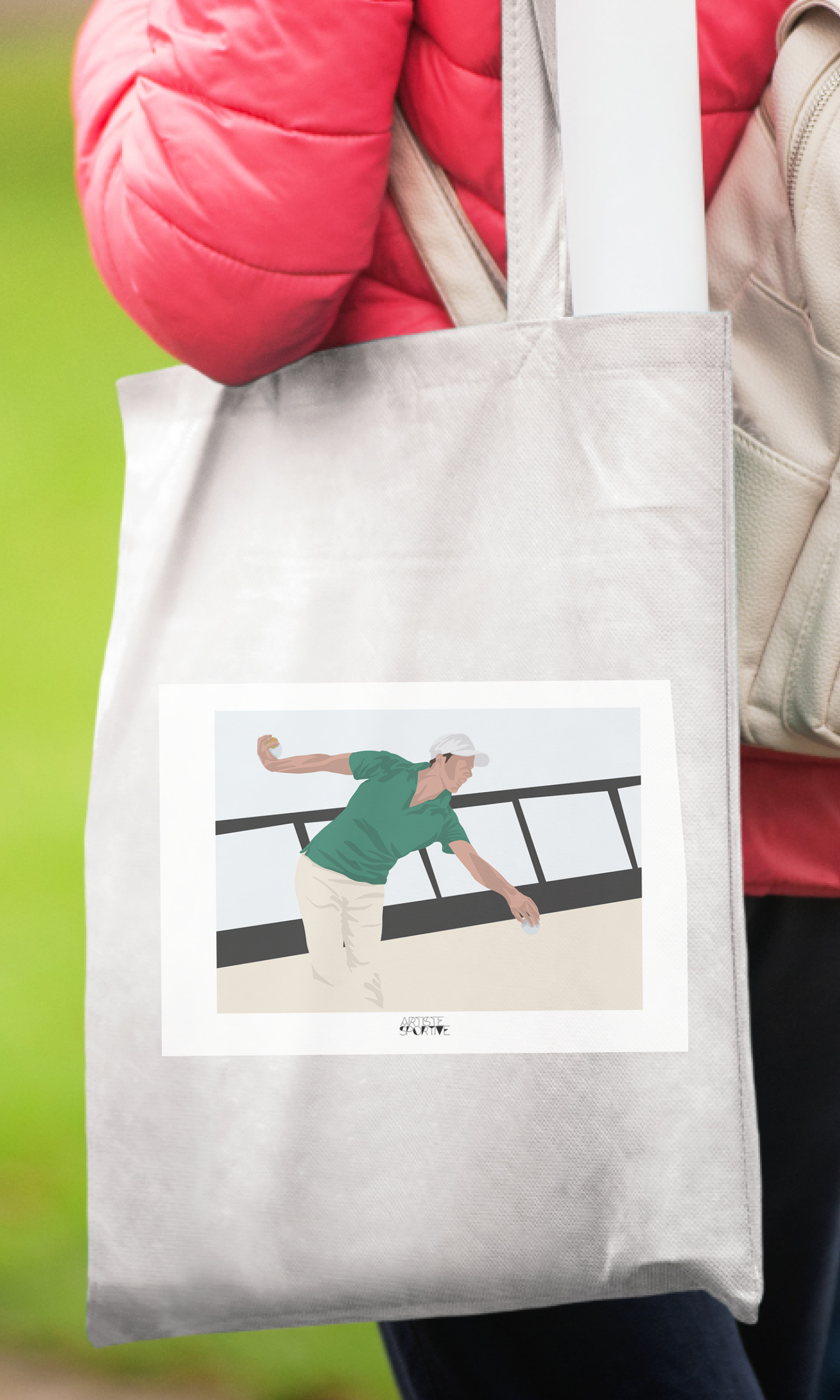 a woman carrying a tote bag with a picture of a woman on it