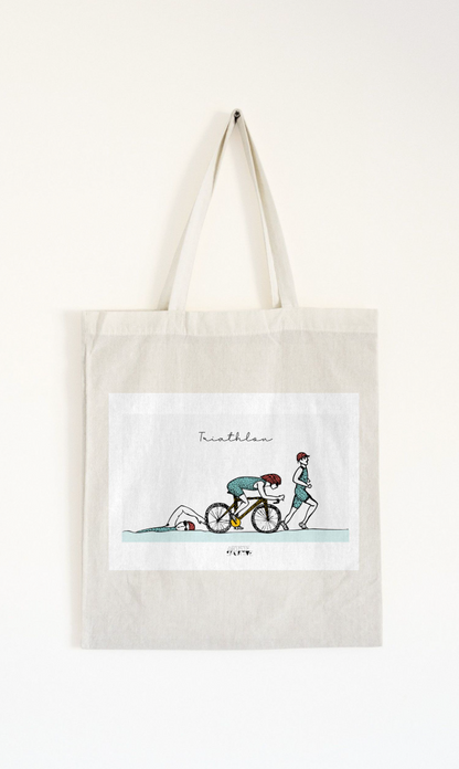 a tote bag with a picture of a person riding a bike
