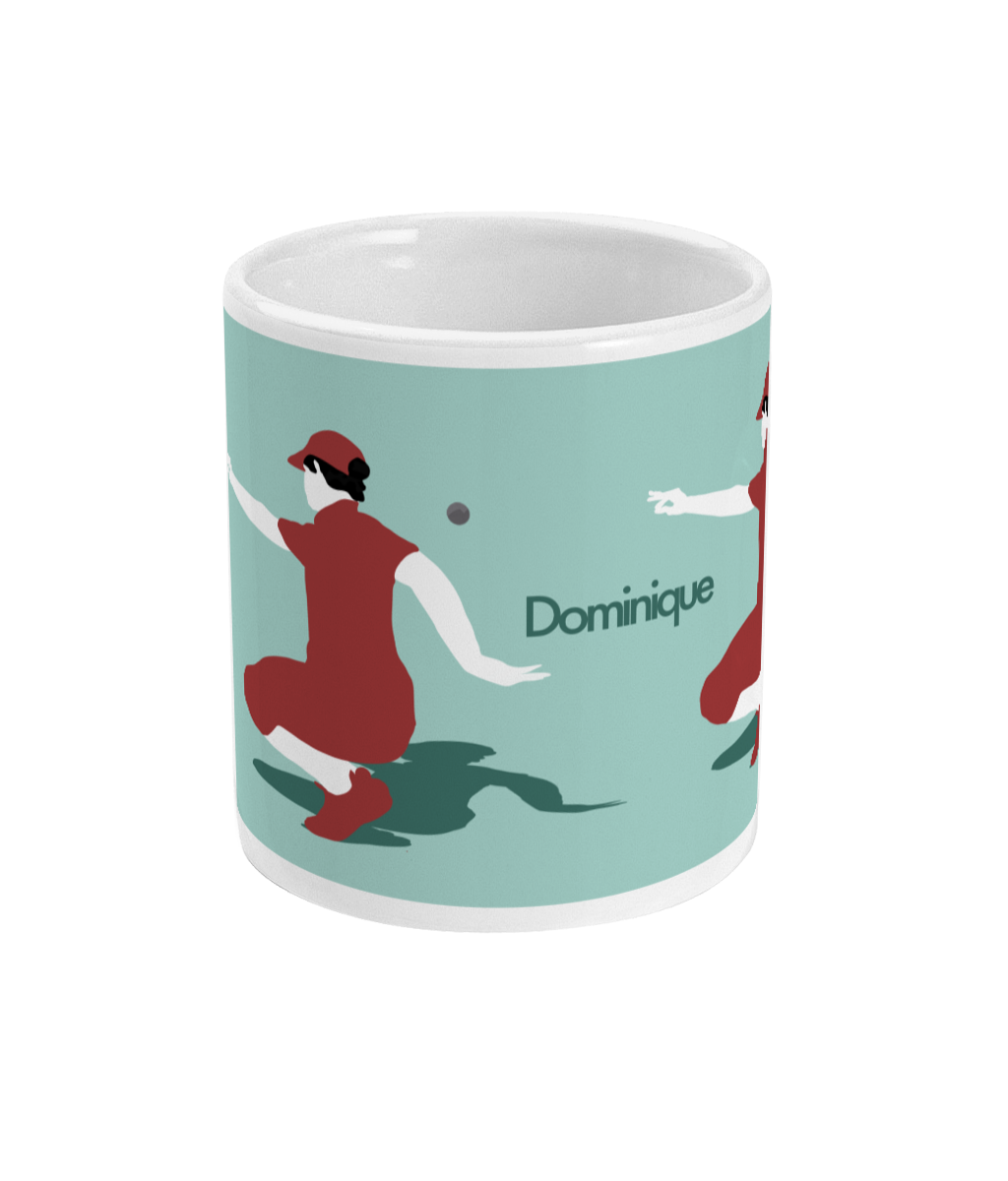 a coffee mug with a woman playing tennis