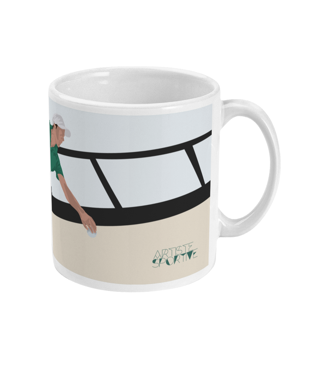 a white coffee mug with a picture of a tennis player