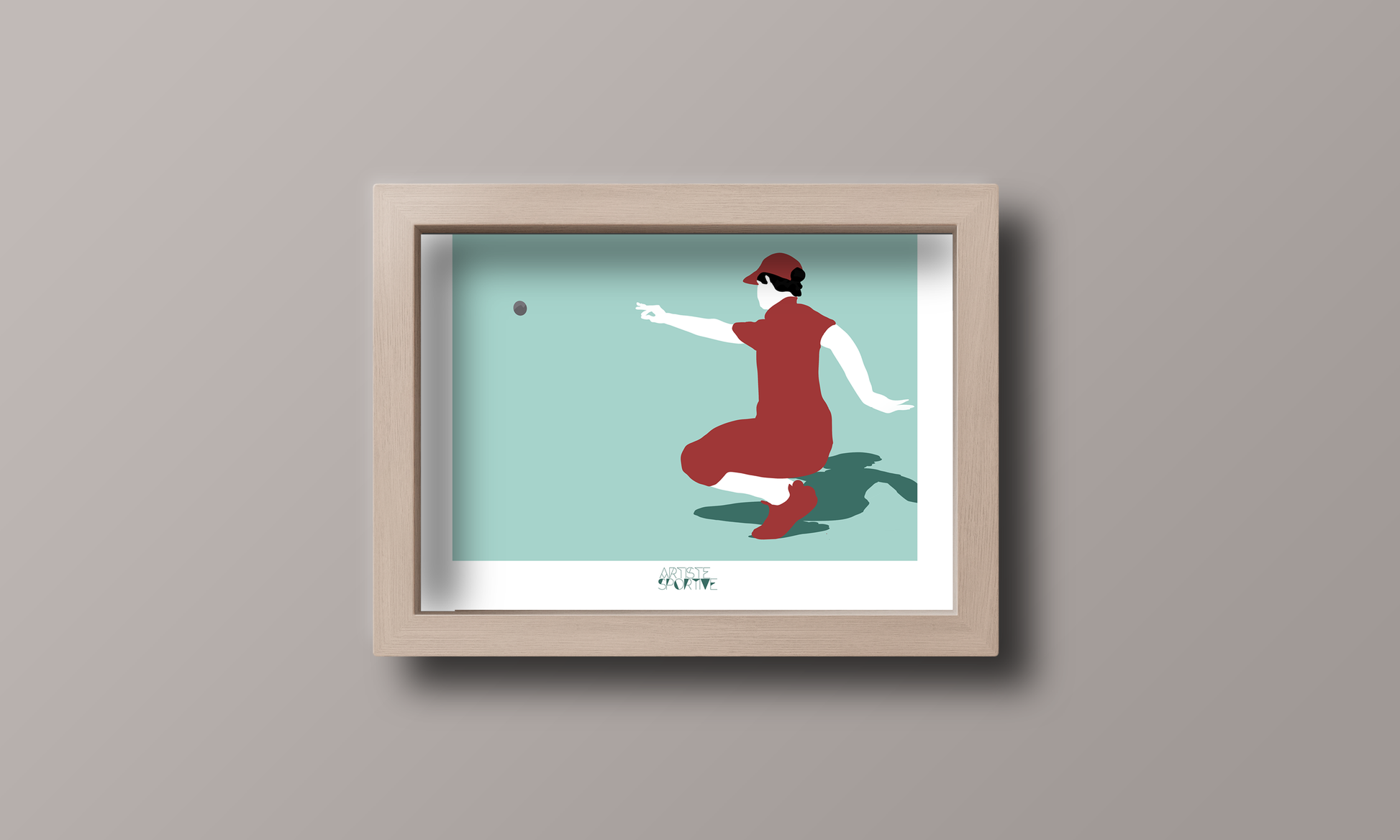 a framed picture of a woman throwing a ball