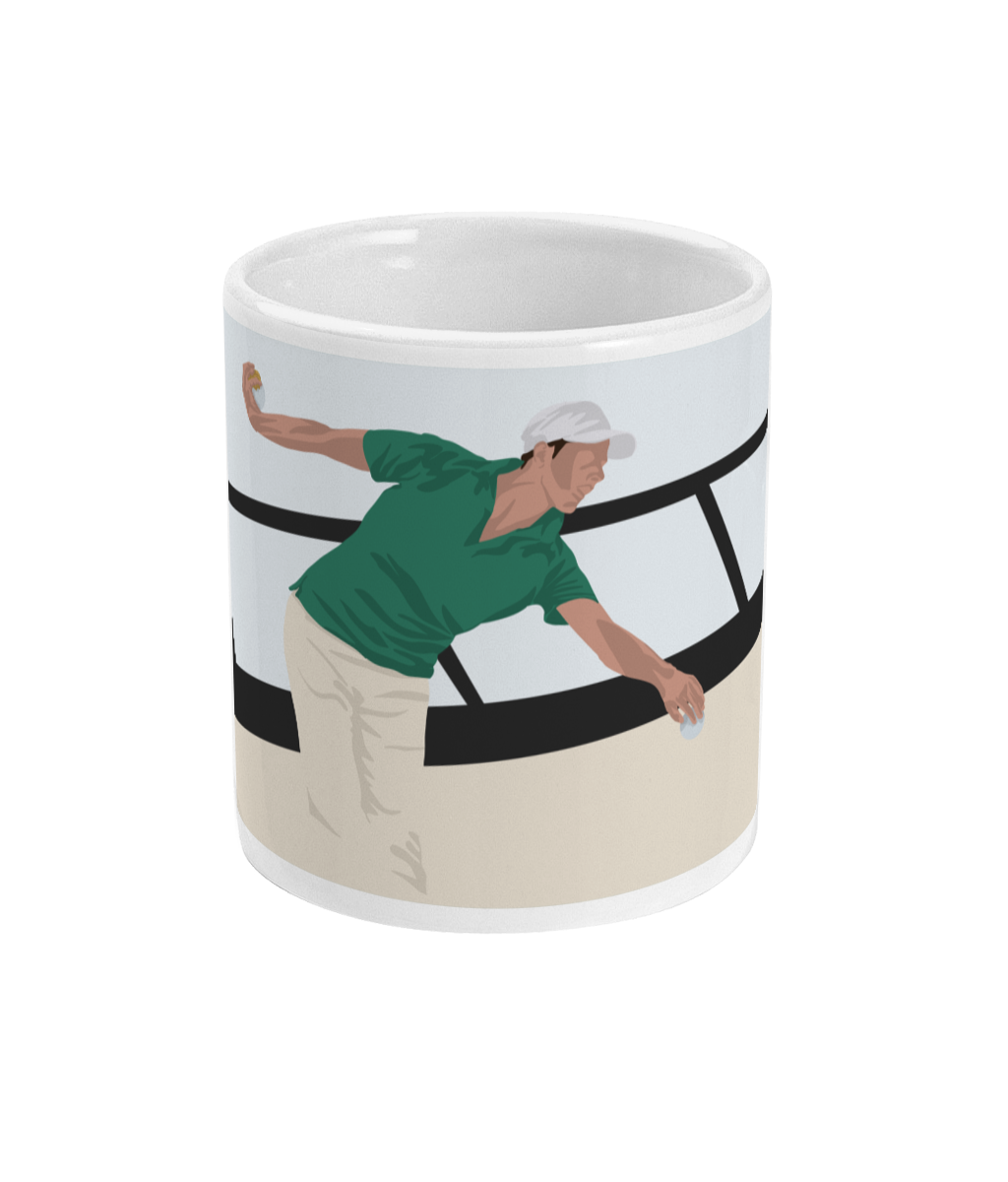 a white coffee mug with a picture of a tennis player