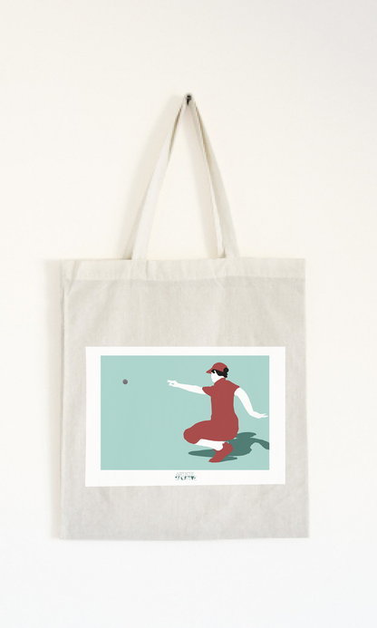 a white bag with a picture of a woman throwing a ball