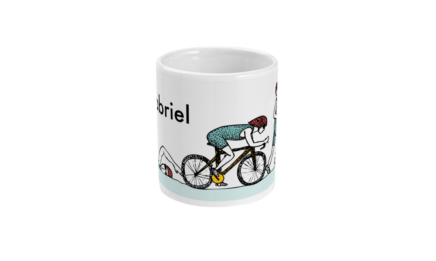 a white coffee mug with a man riding a bike