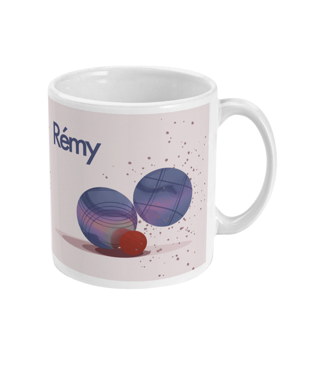 a white coffee mug with a picture of two balls on it