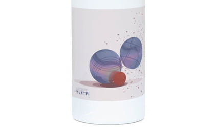 a white bottle with a purple and red design on it