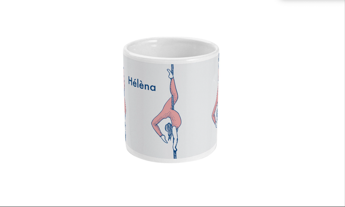 a coffee mug with a picture of a woman doing a handstand