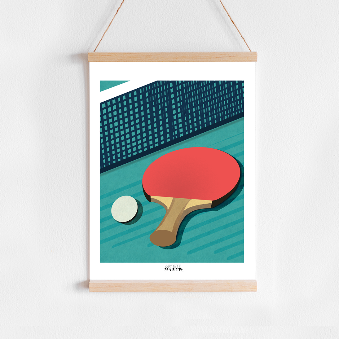 a picture of a ping pong racket and ball hanging on a wall