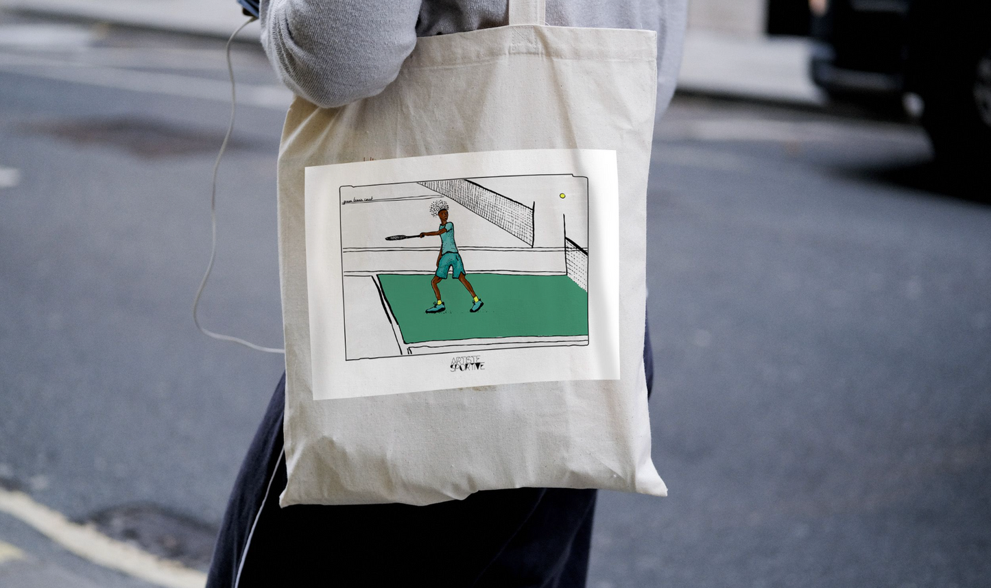 a person holding a bag with a picture of a tennis player on it