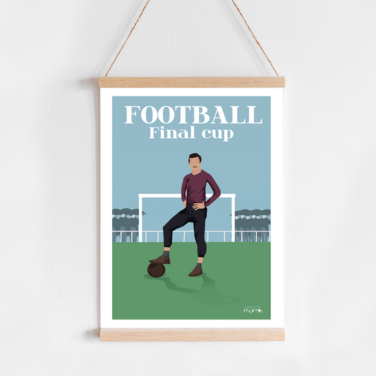 a poster hanging on a wall of a man kicking a soccer ball