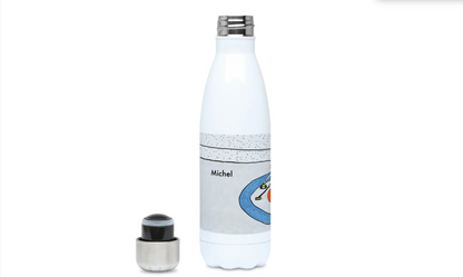 a white water bottle next to a metal container