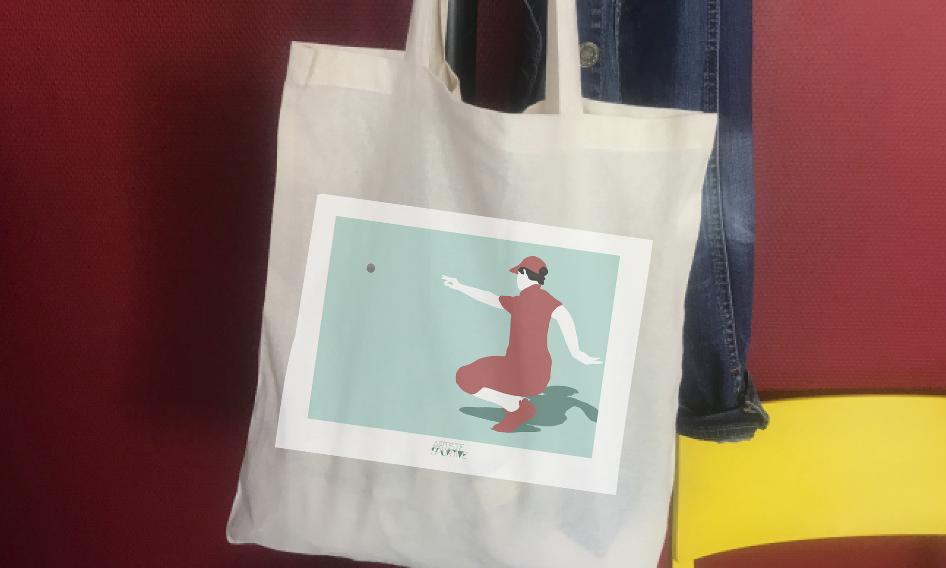 a white bag with a picture of a woman throwing a ball