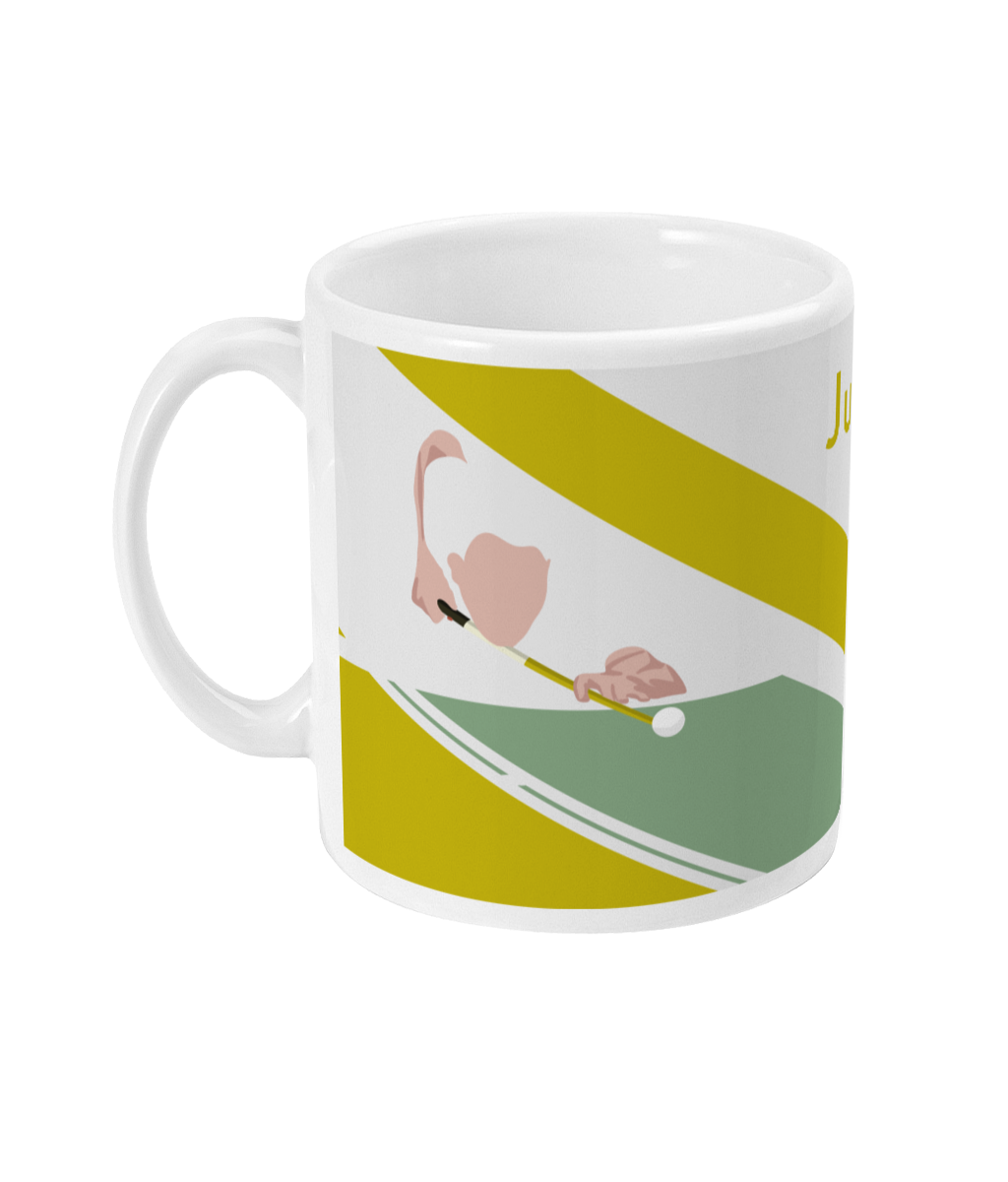 a white coffee mug with a flamingo on it