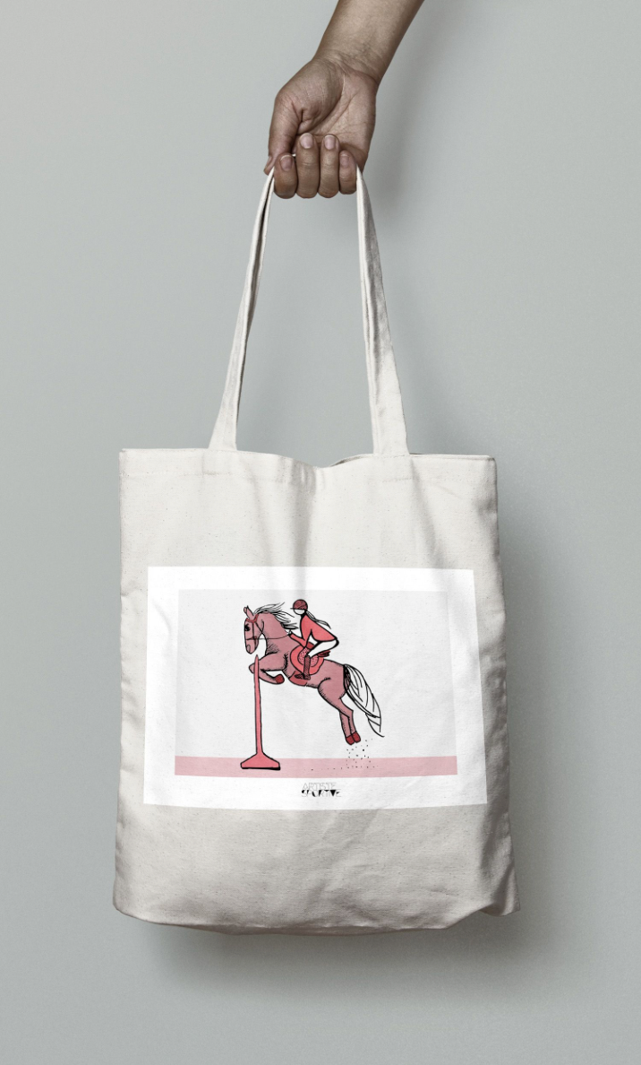 a person holding a bag with a picture of a horse on it