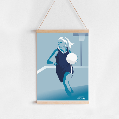 a picture hanging on a wall of a woman with a tennis racket