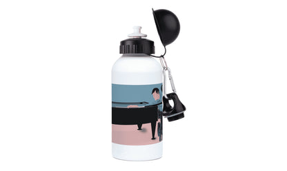 a water bottle with a picture of a man playing the piano