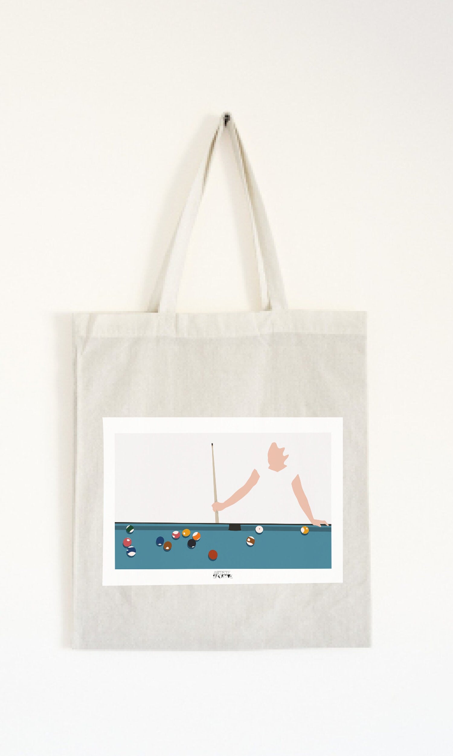 a tote bag hanging on a wall