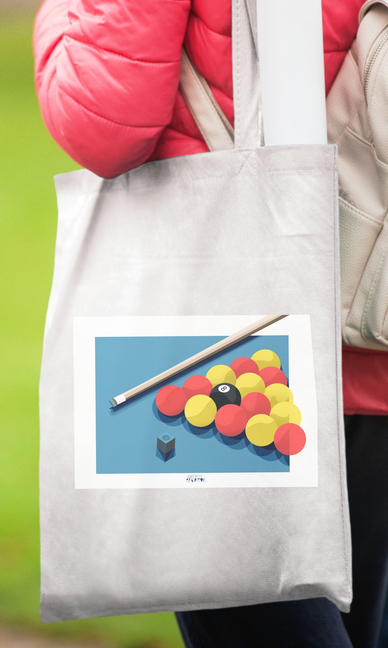 a person holding a bag with a picture on it