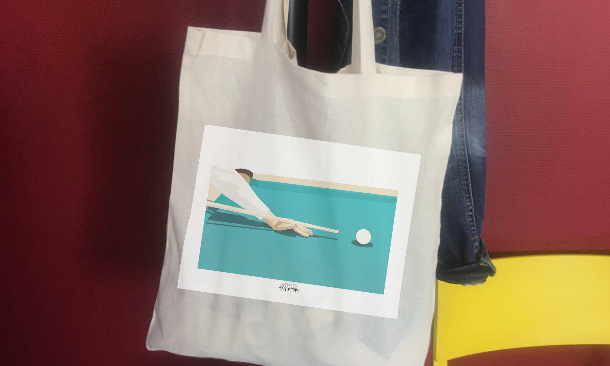 a white bag with a picture of a tennis player on it