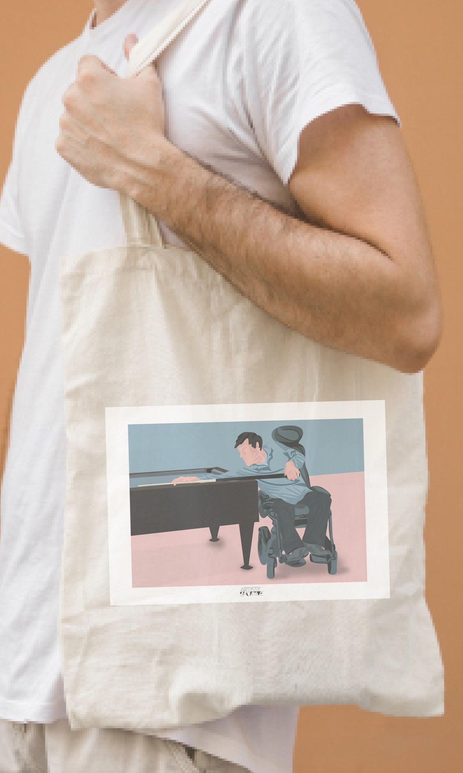 a man holding a tote bag with a picture of a man playing a pool