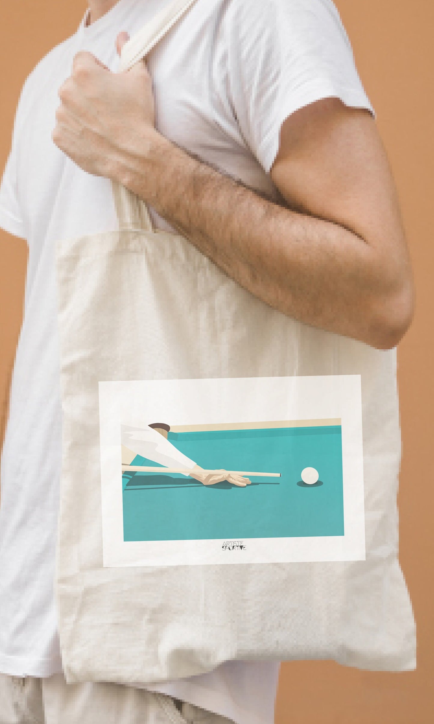 a man holding a white bag with a picture of a person on it